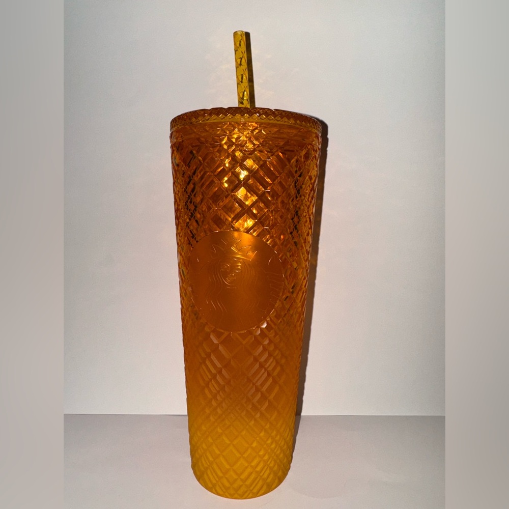 Orange jeweled Starbucks cup
